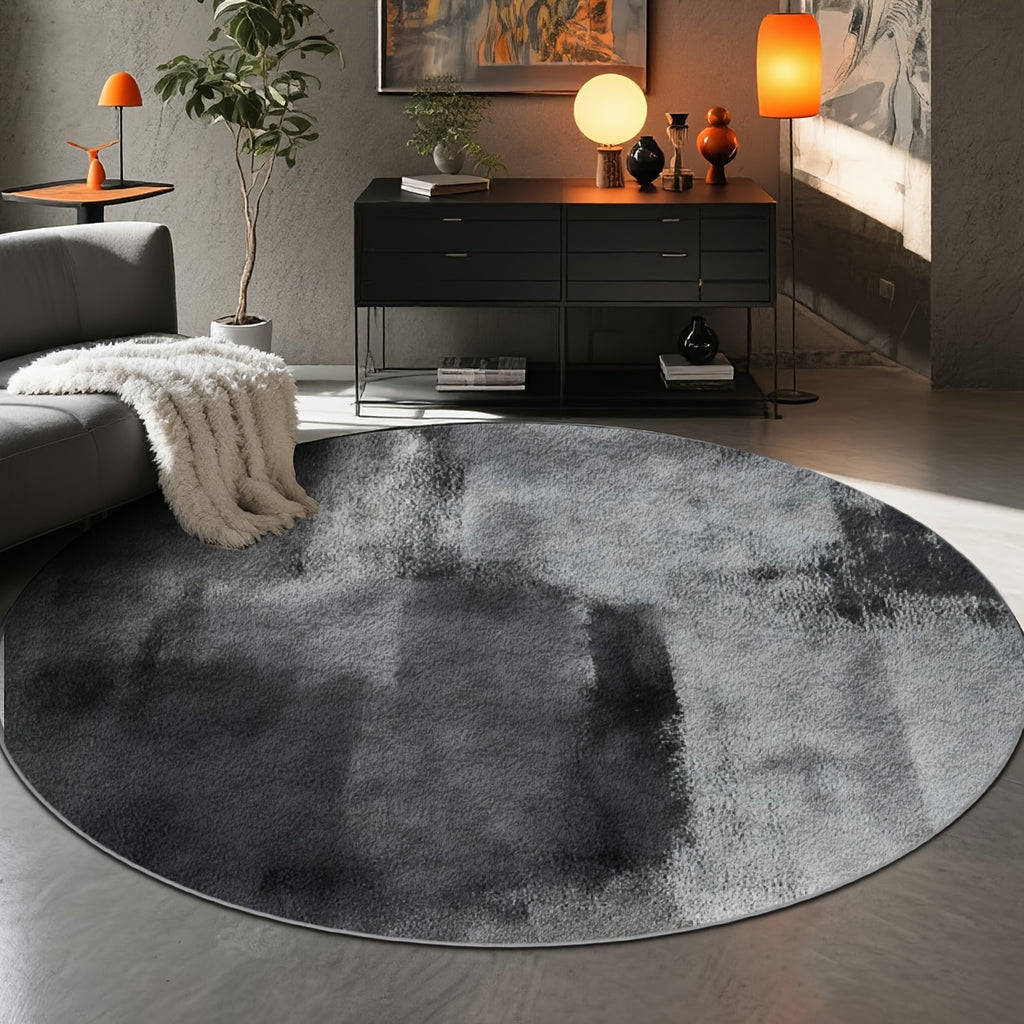 Tapis rond gris anthracite en lavis d'encre, dos à pois