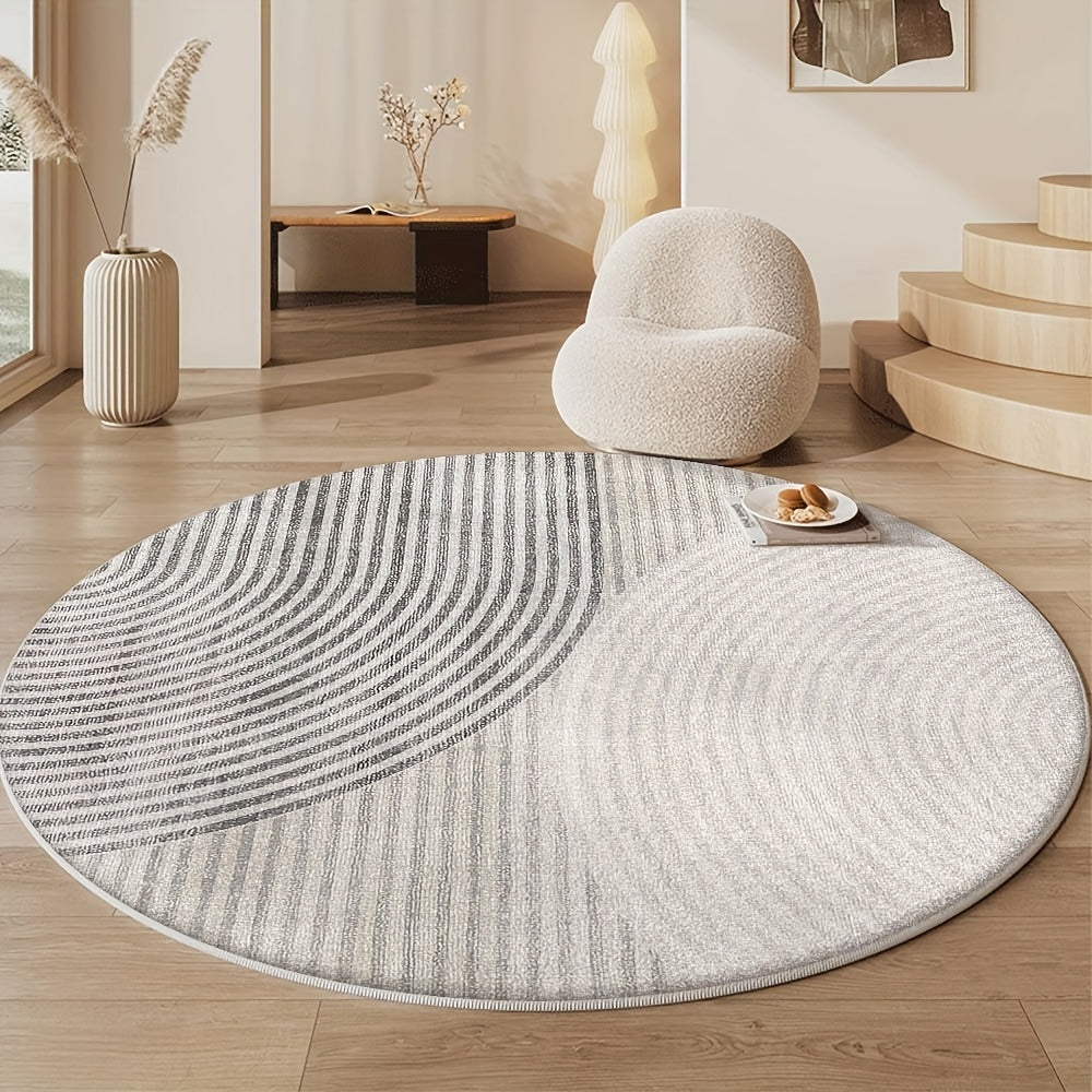 Tapis rond gris à grands arcs rayés et dos PVC antidérapant