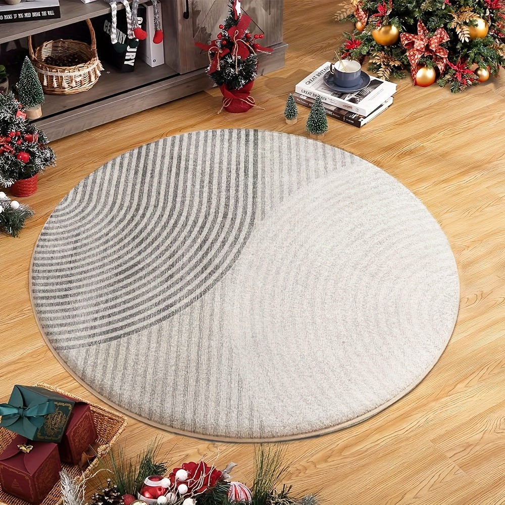 Tapis rond gris à grands arcs rayés et dos PVC antidérapant