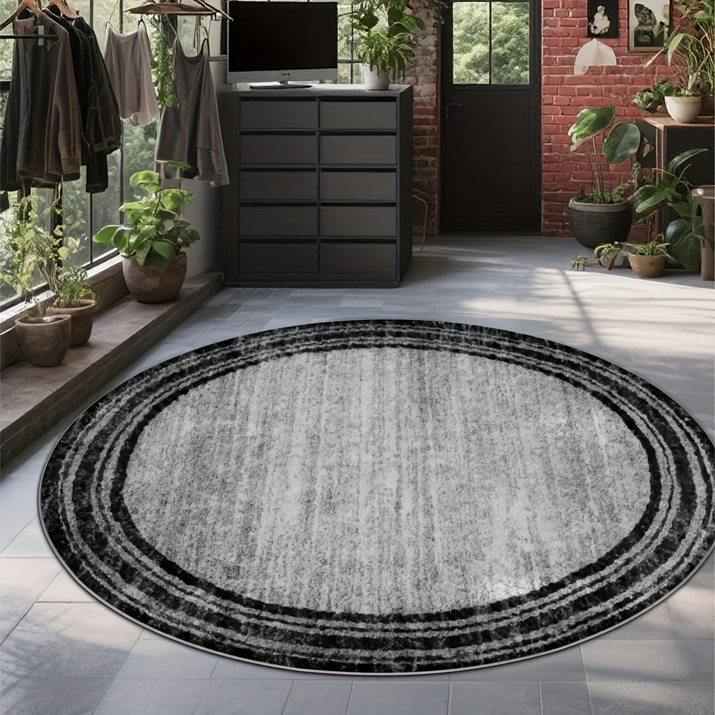 Tapis rond gris vintage à rayures délavées, bordure noire