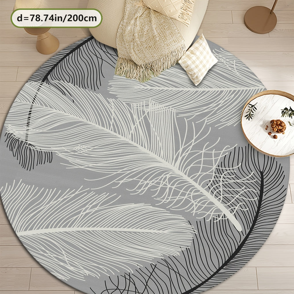 Tapis rond gris motif grande plume blanche, Ø 80 et Ø 100 cm