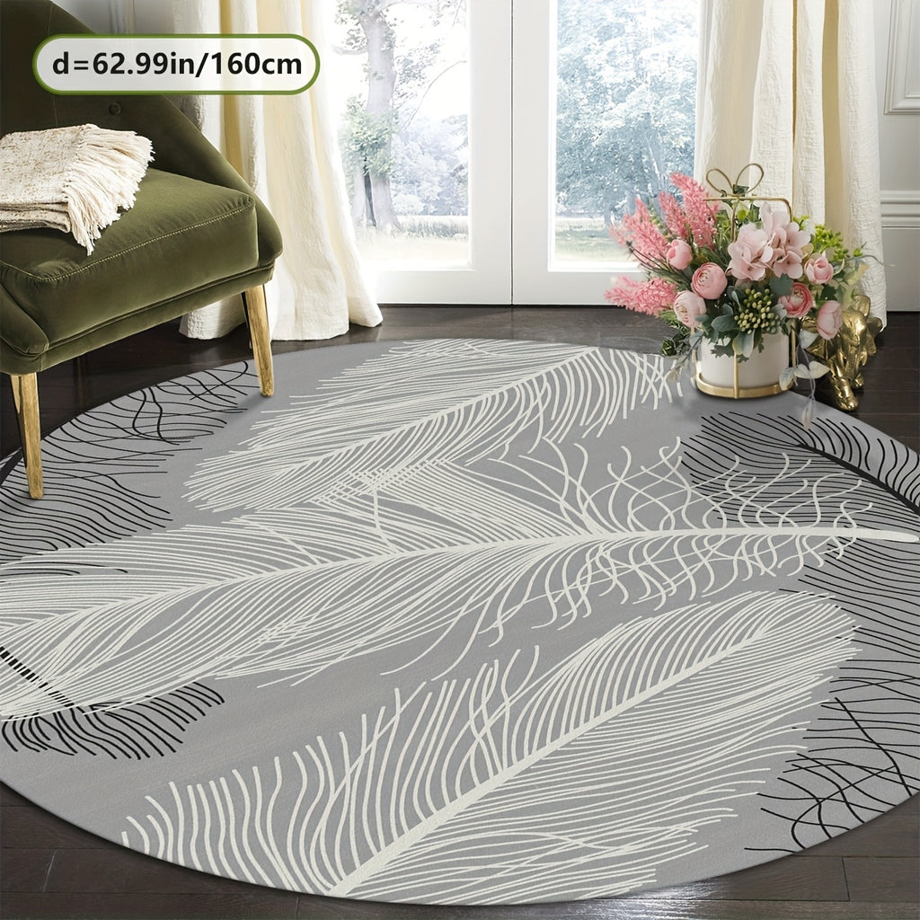 Tapis rond gris motif grande plume blanche, Ø 80 et Ø 100 cm