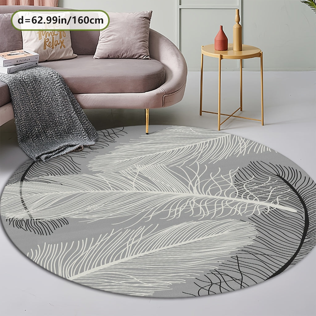 Tapis rond gris motif grande plume blanche, Ø 80 et Ø 100 cm