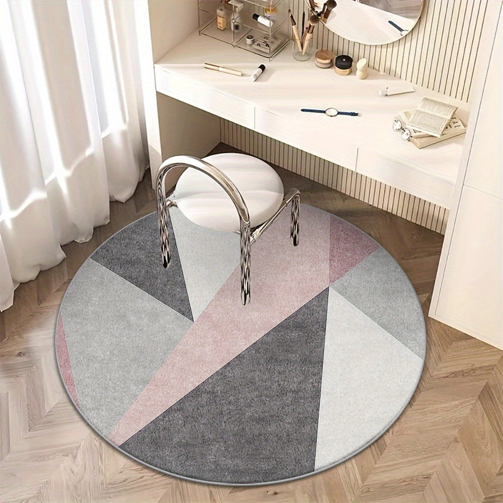 Tapis rond gris et rose à triangles, dos plastique à picots
