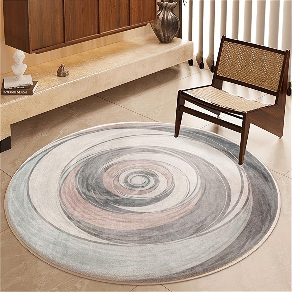 Tapis rond à spirale peinte gris et rose poudré, Ø 120 à 200