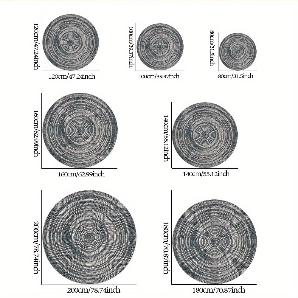 Tapis rond gris à spirale dégradée, envers moucheté noir