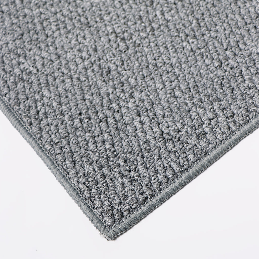 Tapis rond gris au tressage wabi-sabi et dos en TPR souple