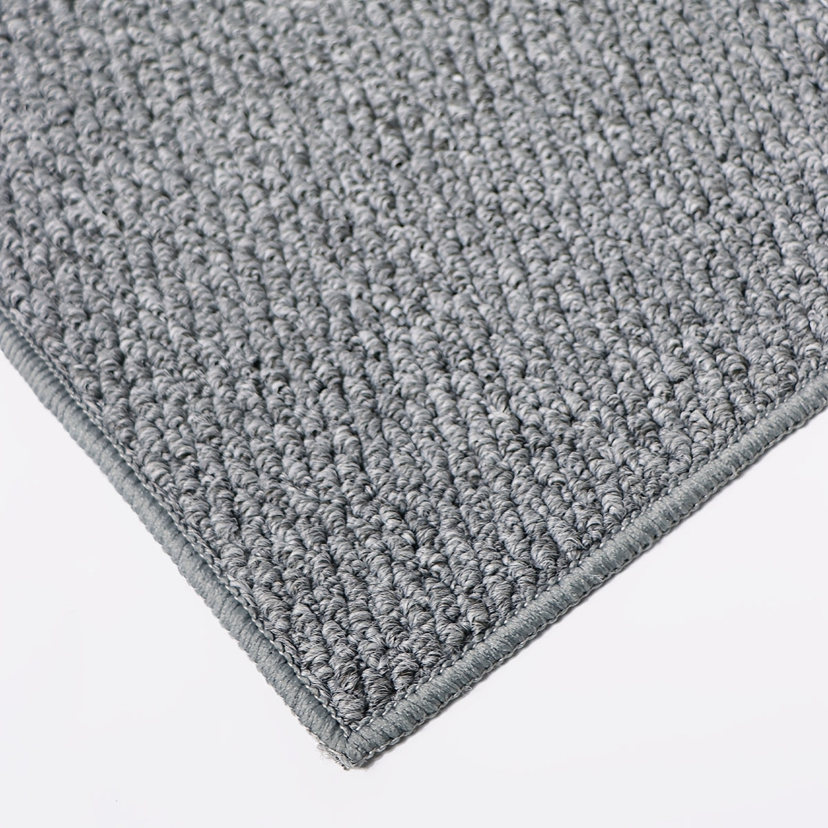 Tapis rond gris au tressage wabi-sabi et dos en TPR souple
