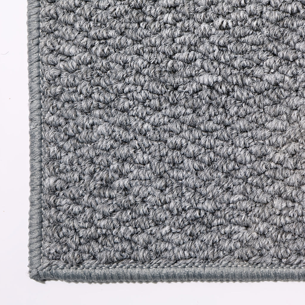 Tapis rond gris au tressage wabi-sabi et dos en TPR souple