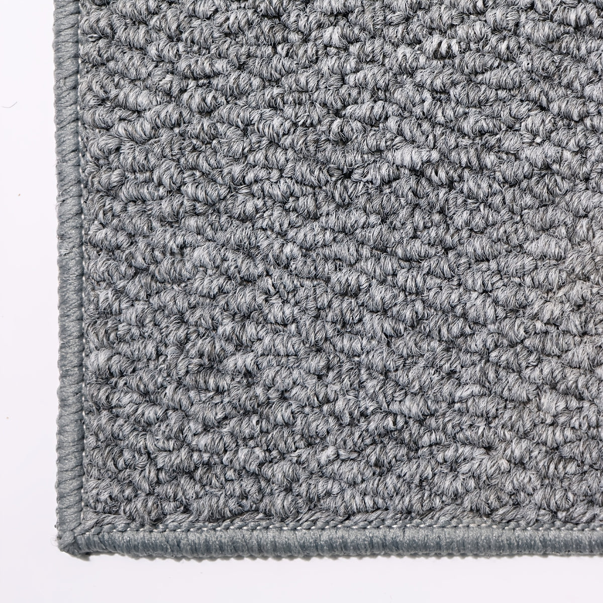 Tapis rond gris au tressage wabi-sabi et dos en TPR souple