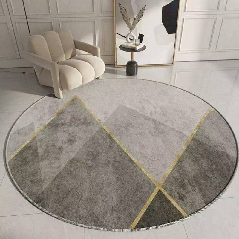 Tapis rond gris en velours, motif cercles ou lignes dorées