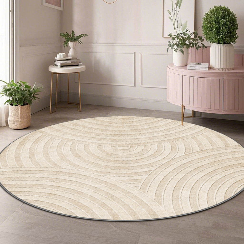 Tapis rond crème à motif d'arcs sculptés, dos à pois adhérent