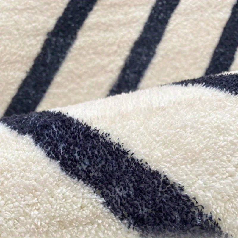 Tapis rond ivoire chevrons bleu nuit, du Ø 80 au Ø 200 cm