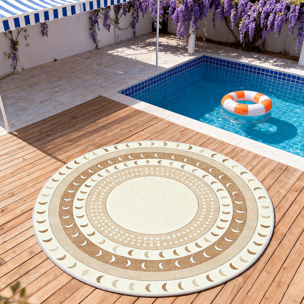 Tapis rond ivoire à couronnes de lunes et de perles dorées