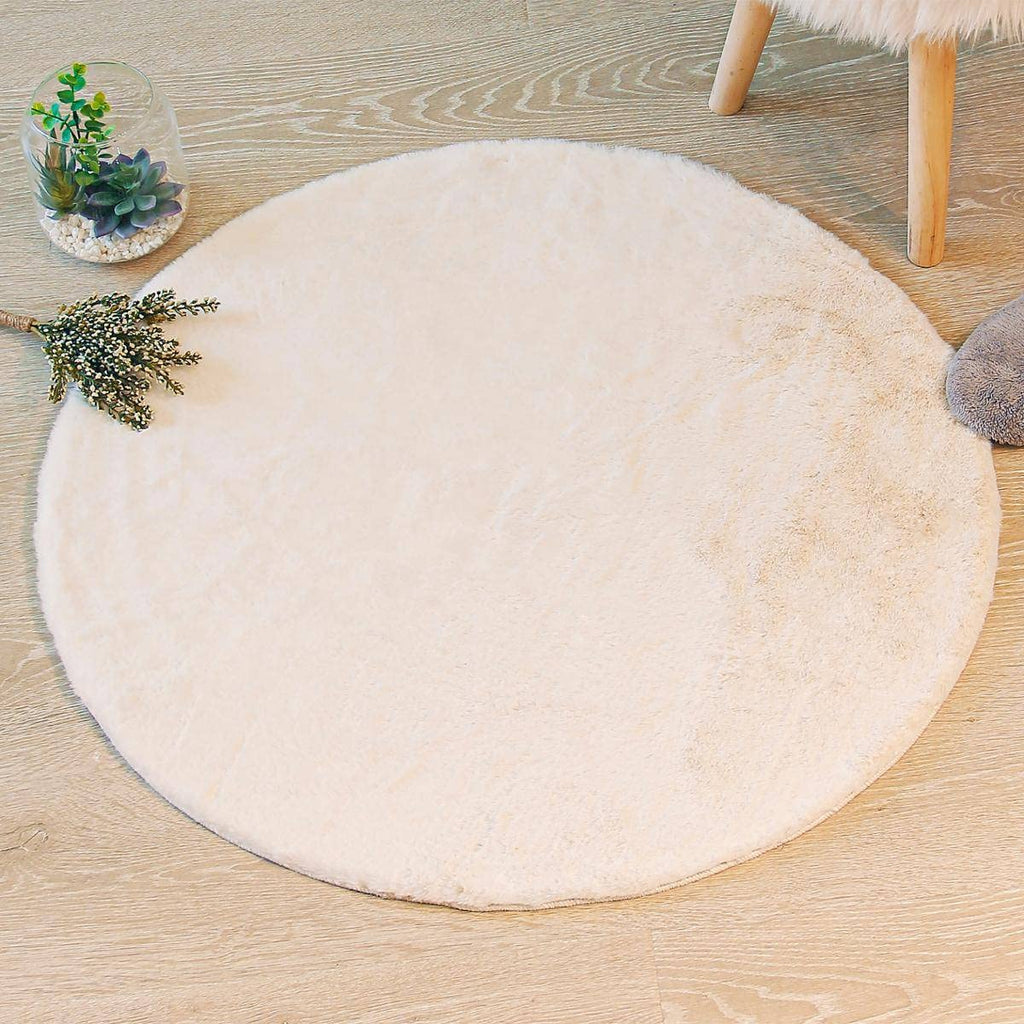 Tapis rond ivoire à effet fourrure ras et dense, Ø 80 cm