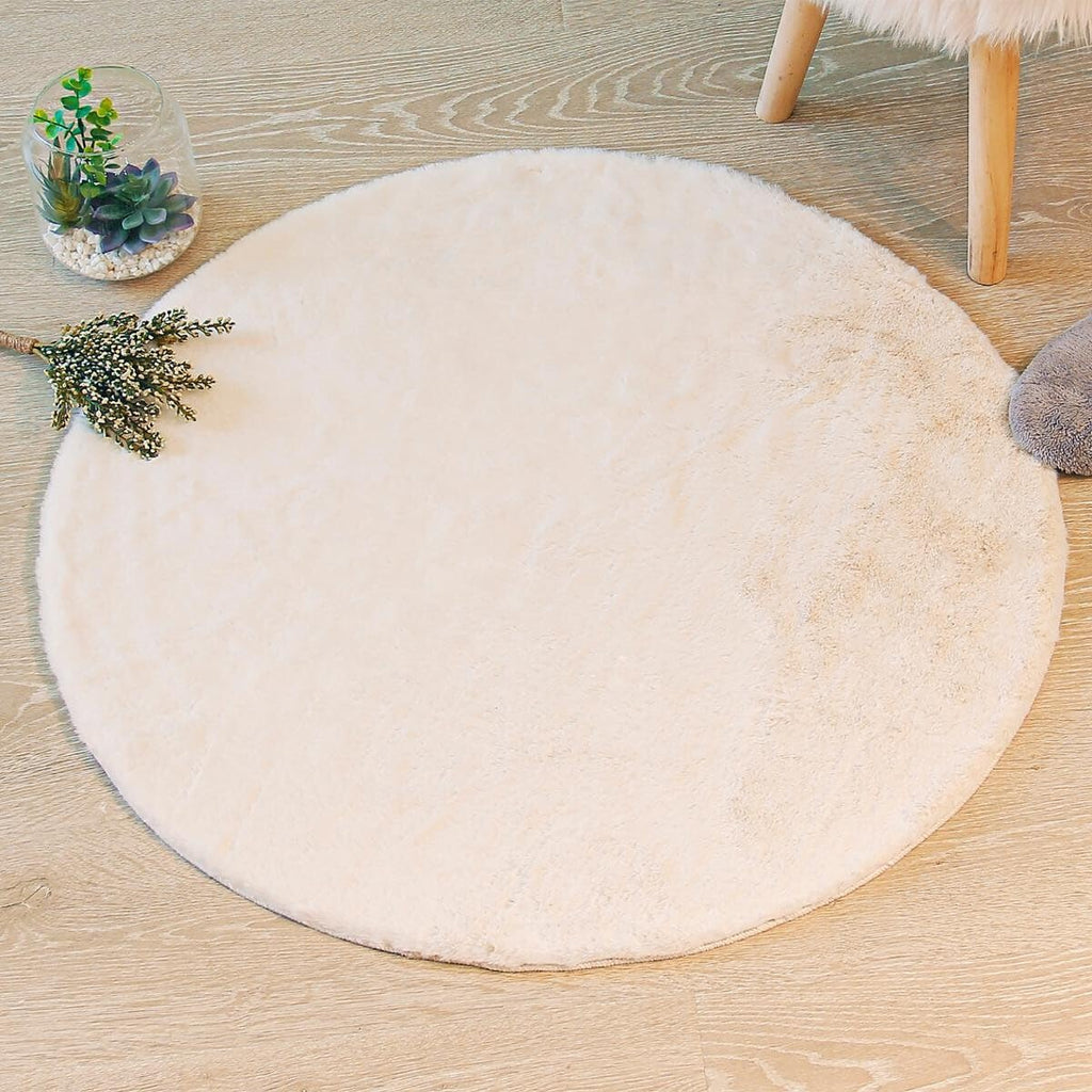 Tapis rond ivoire à effet fourrure ras et dense, Ø 80 cm
