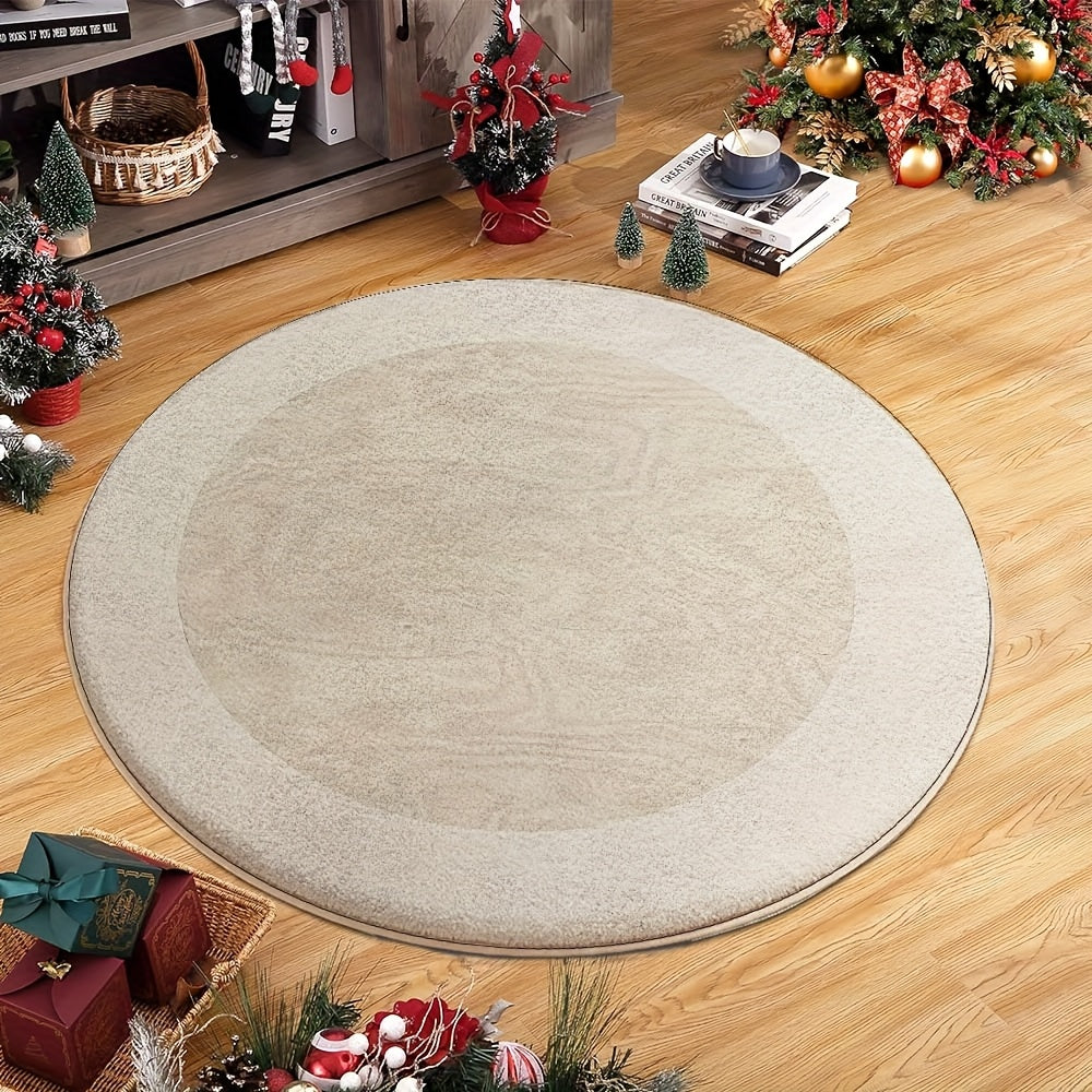 Tapis rond ivoire à effet moiré et large bordure unie crème