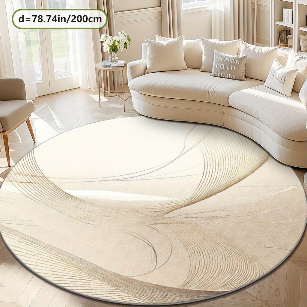 Tapis rond ivoire à filigrane doré, trois cotes Ø 80-200