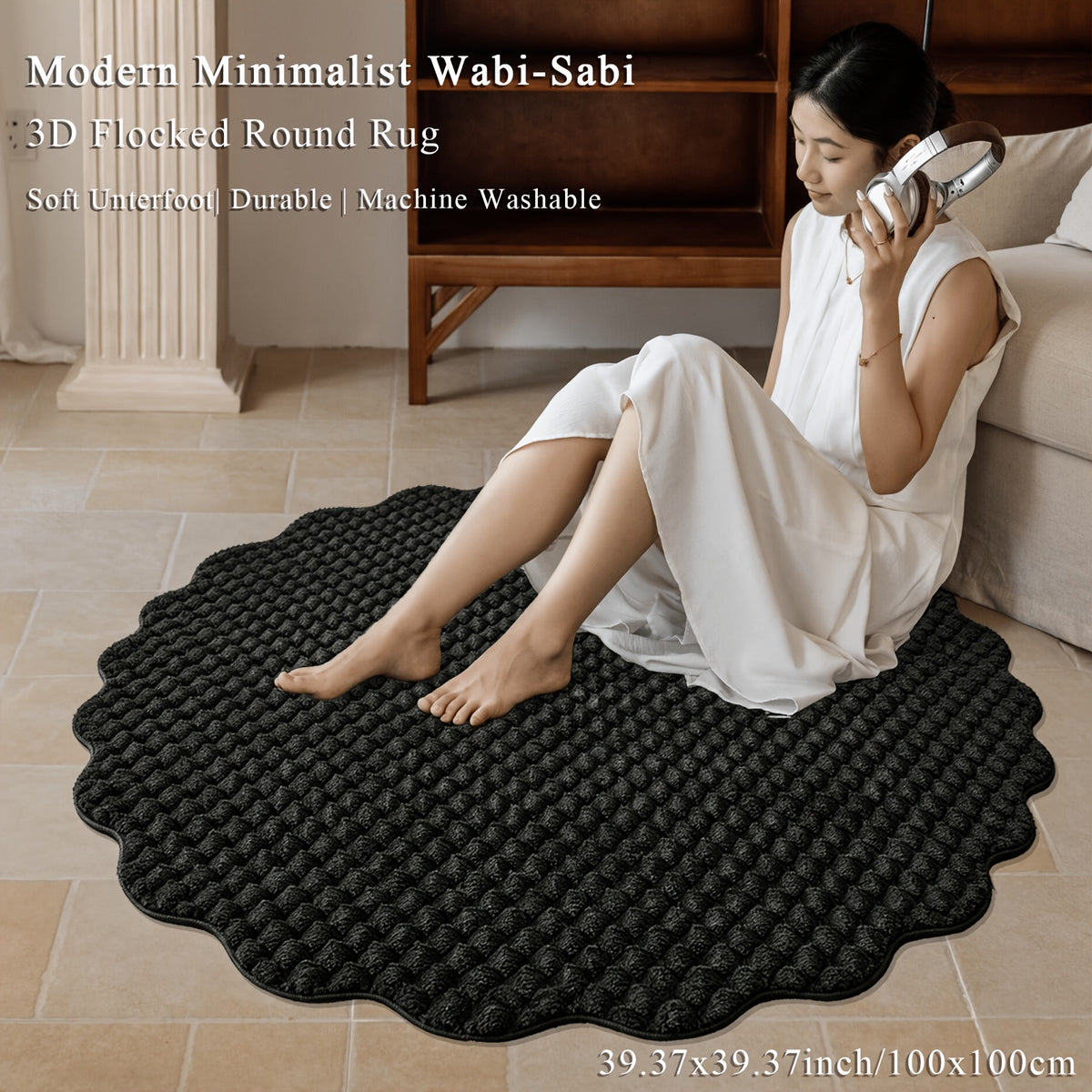 Tapis rond noir à bord festonné et relief floqué en bulles
