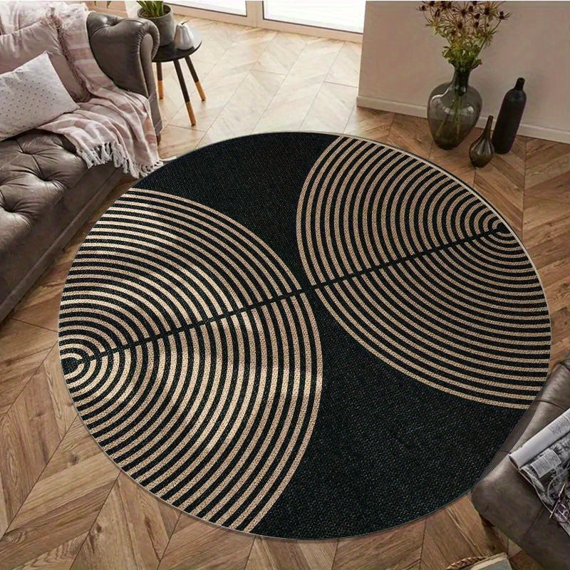 Tapis rond noir à cercles dorés, format unique Ø 120 cm