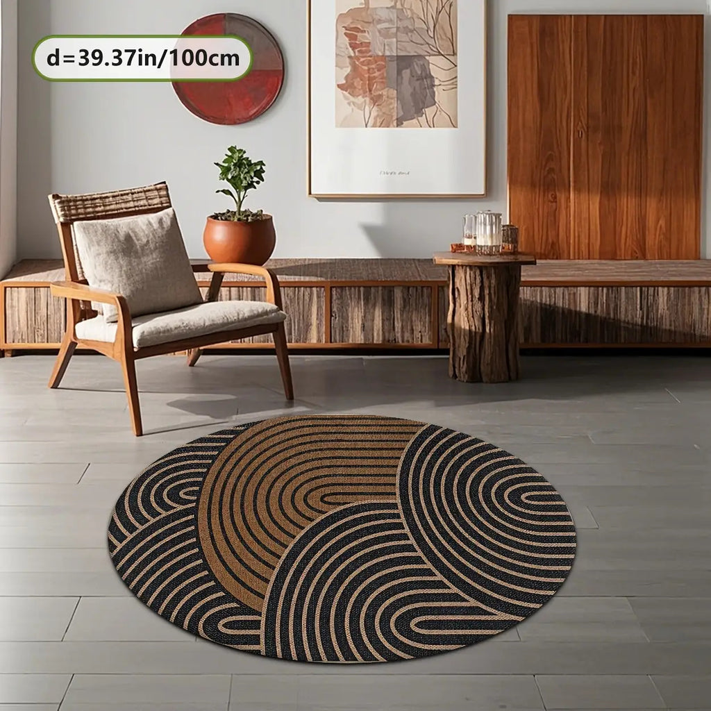Tapis rond mi-noir et mi-camel, trois arcs emboîtés rayés