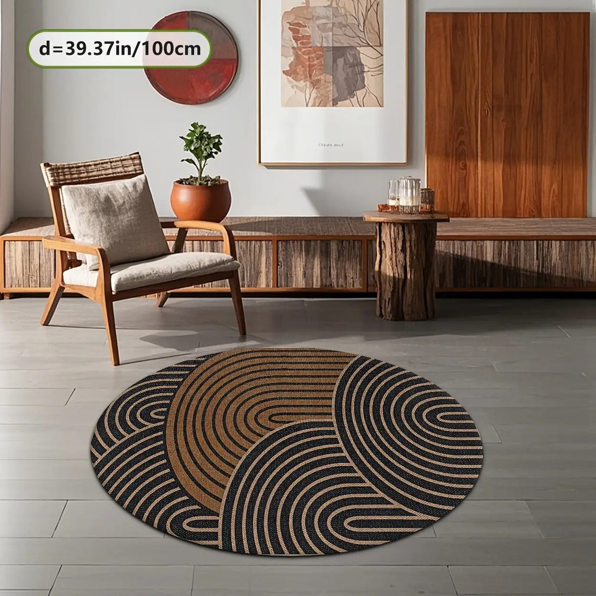 Tapis rond mi-noir et mi-camel, trois arcs emboîtés rayés