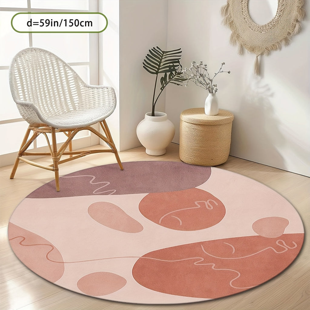 Tapis rond motif galets, rose poudré, prune et terracotta
