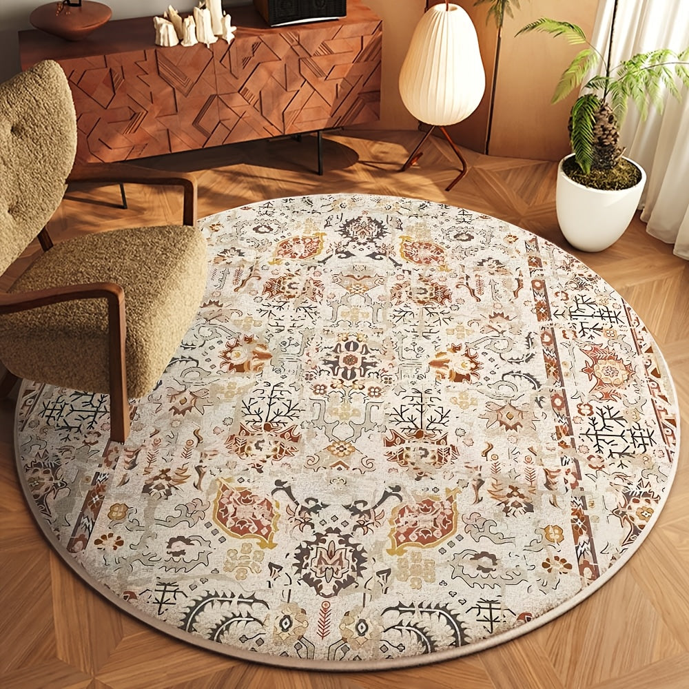 Tapis rond motif persan vieilli, ivoire, rouille et ocre