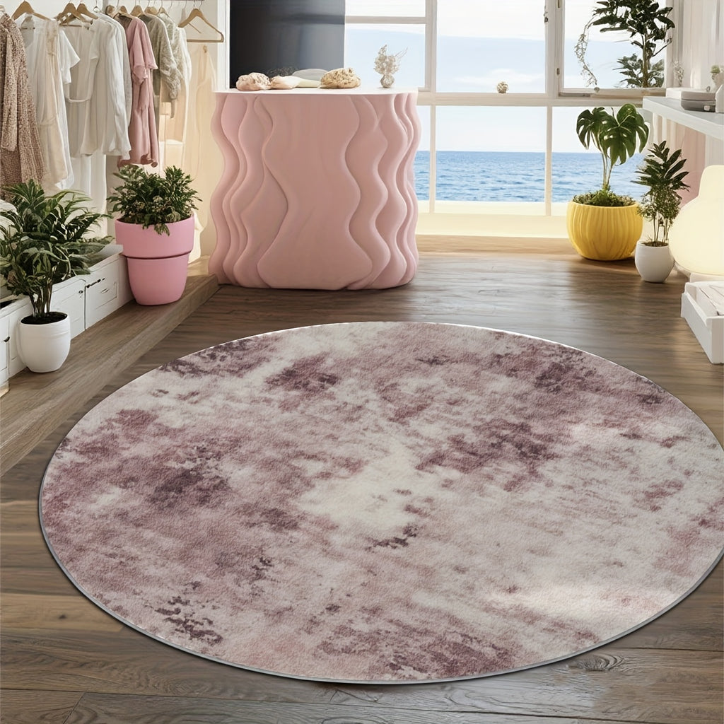 Tapis rond rose poudré à l'encre délavée, effet aquarelle