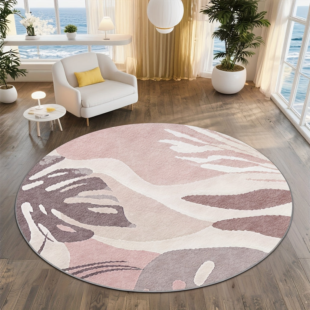 Tapis rond rose poudré à feuillage abstrait mauve et crème
