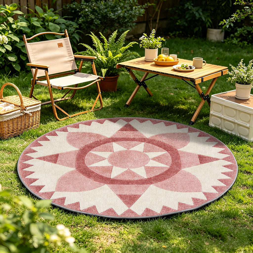 Tapis rond rose poudré à grande rosace étoilée en patchwork