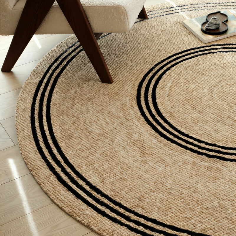 Tapis rond sable façon tressage, dix millimètres de velours