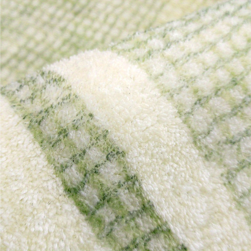 Tapis rond shaggy vert et crème à cercles, à poils longs