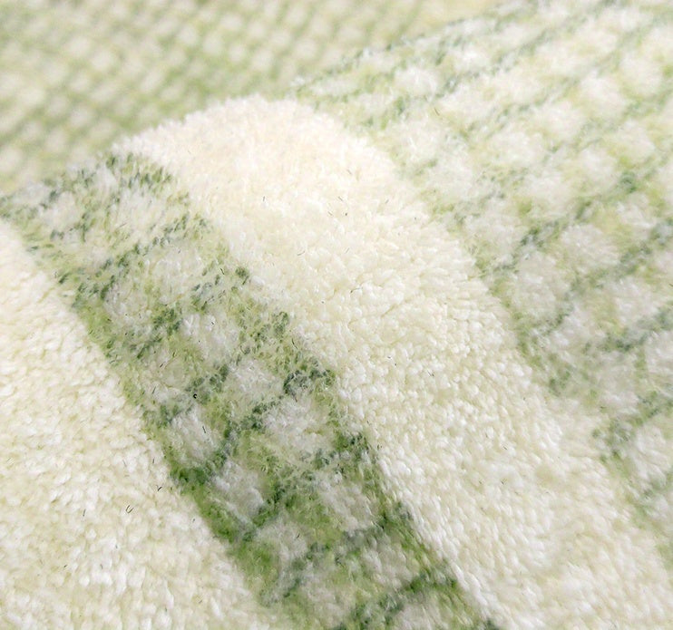 Tapis rond shaggy vert et crème à cercles, à poils longs