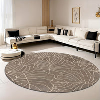 Tapis rond taupe aux grandes feuilles de monstera crème