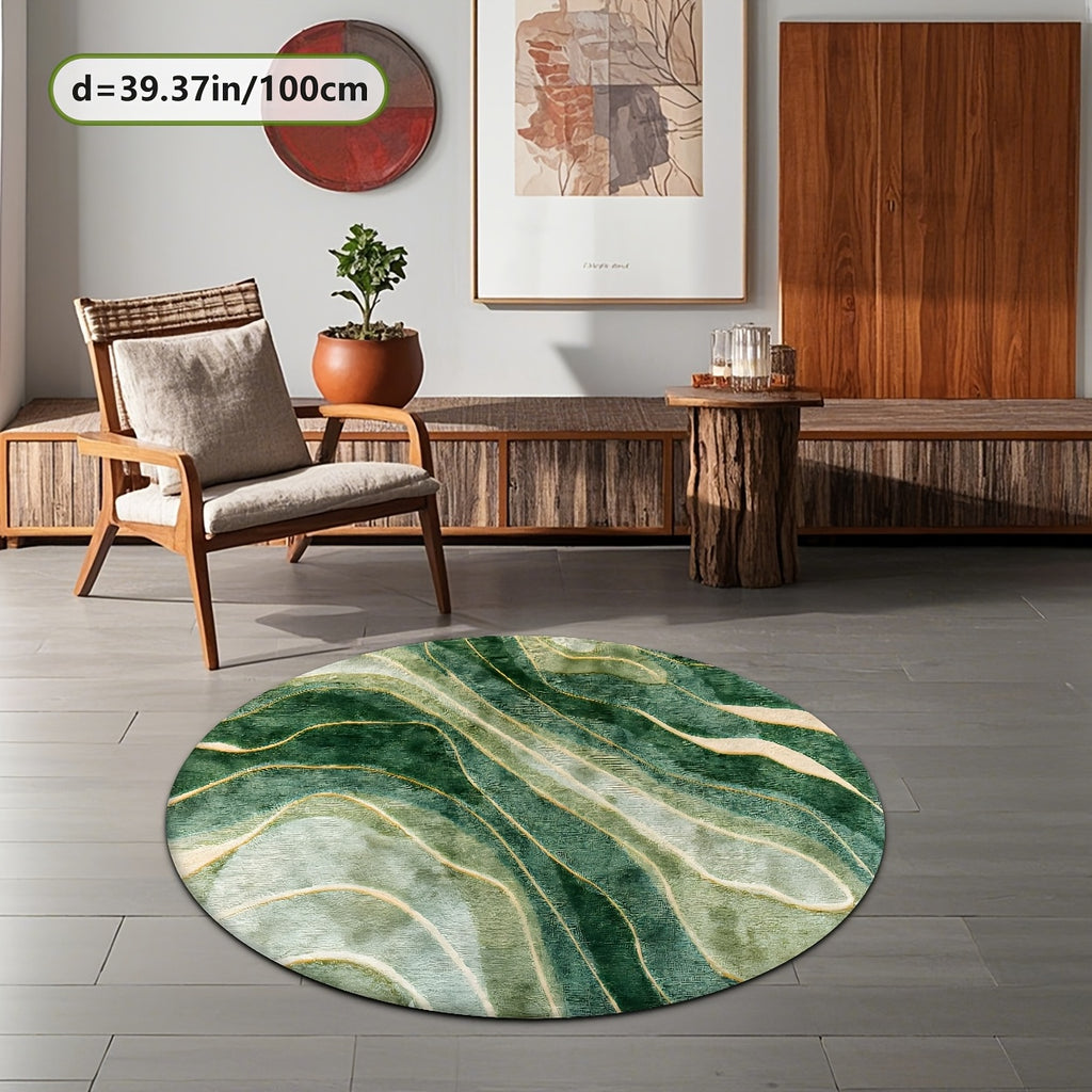 Tapis rond vert émeraude aux veines dorées, effet marbré
