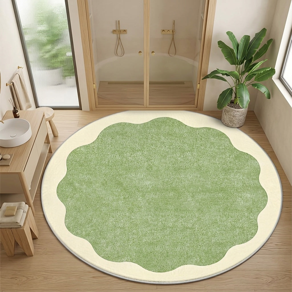Tapis rond vert sauge à bord festonné crème, dos à points