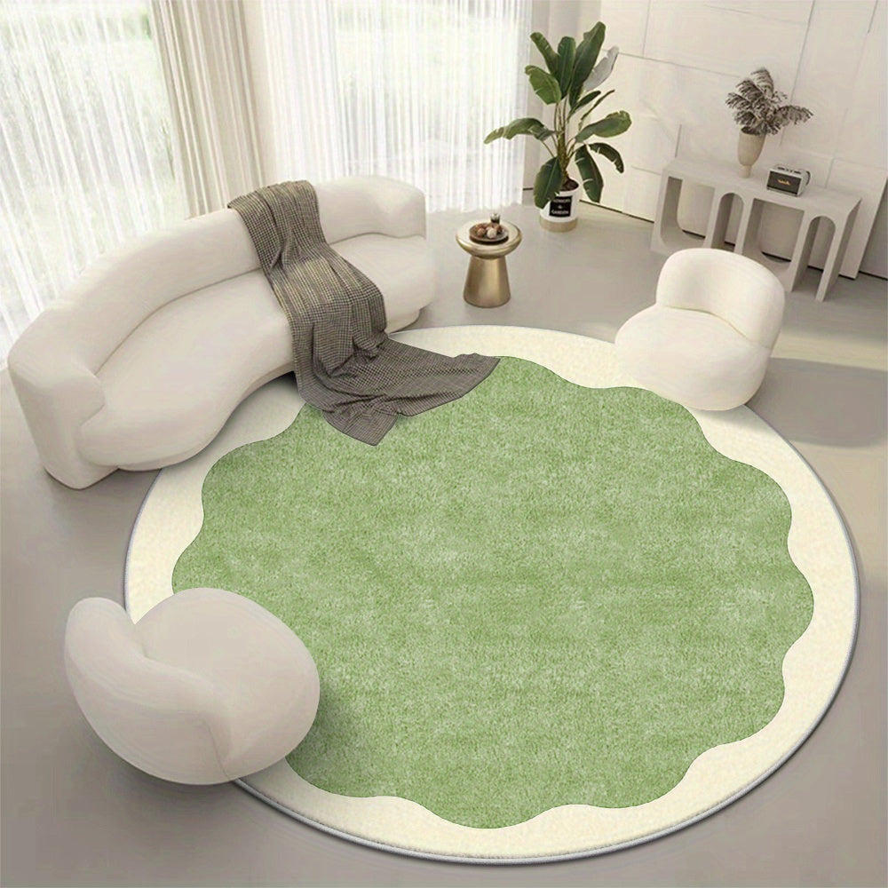 Tapis rond vert sauge à bord festonné crème, dos à points
