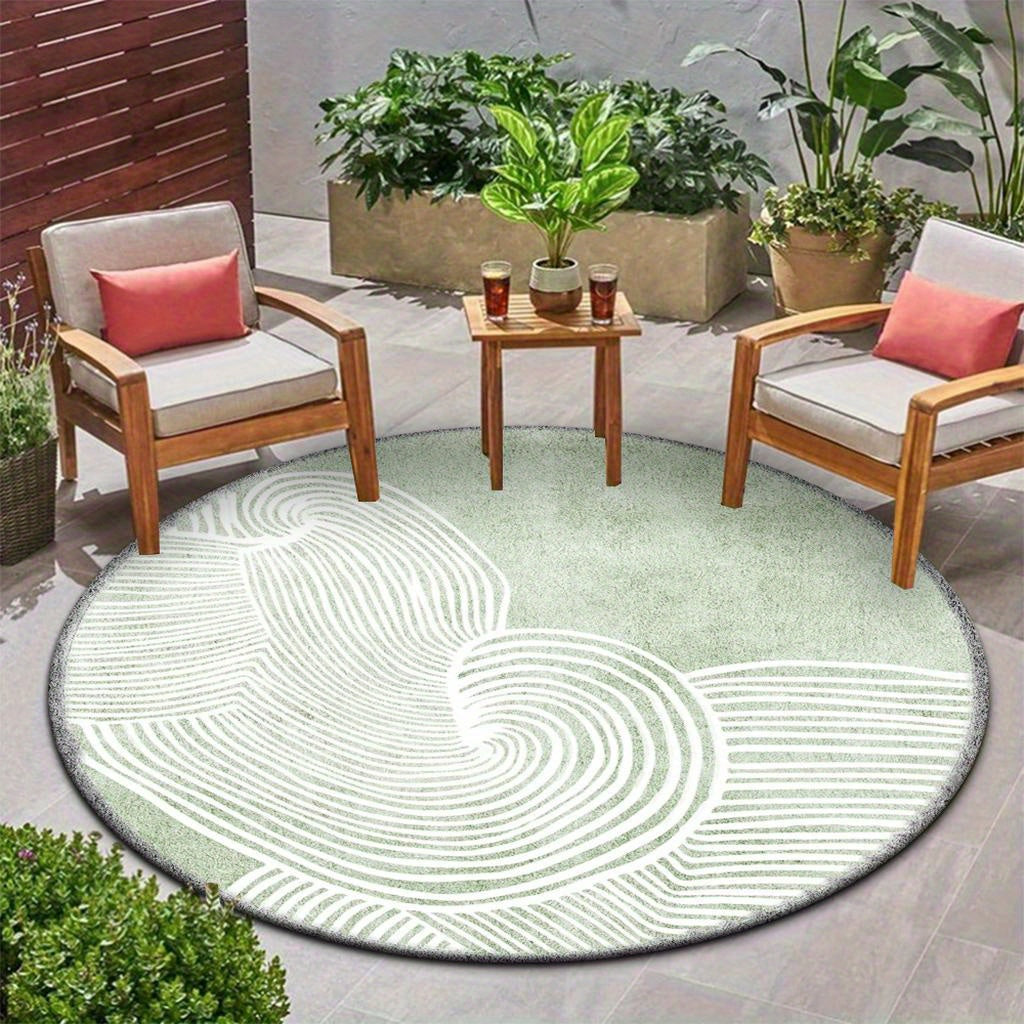 Tapis rond vert sauge à lignes courbes blanches abstraites