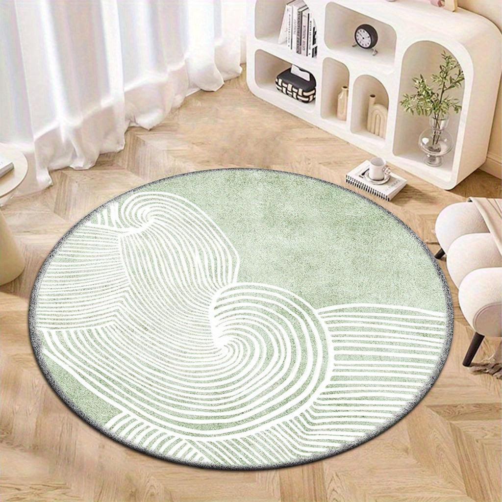 Tapis rond vert sauge à lignes courbes blanches abstraites