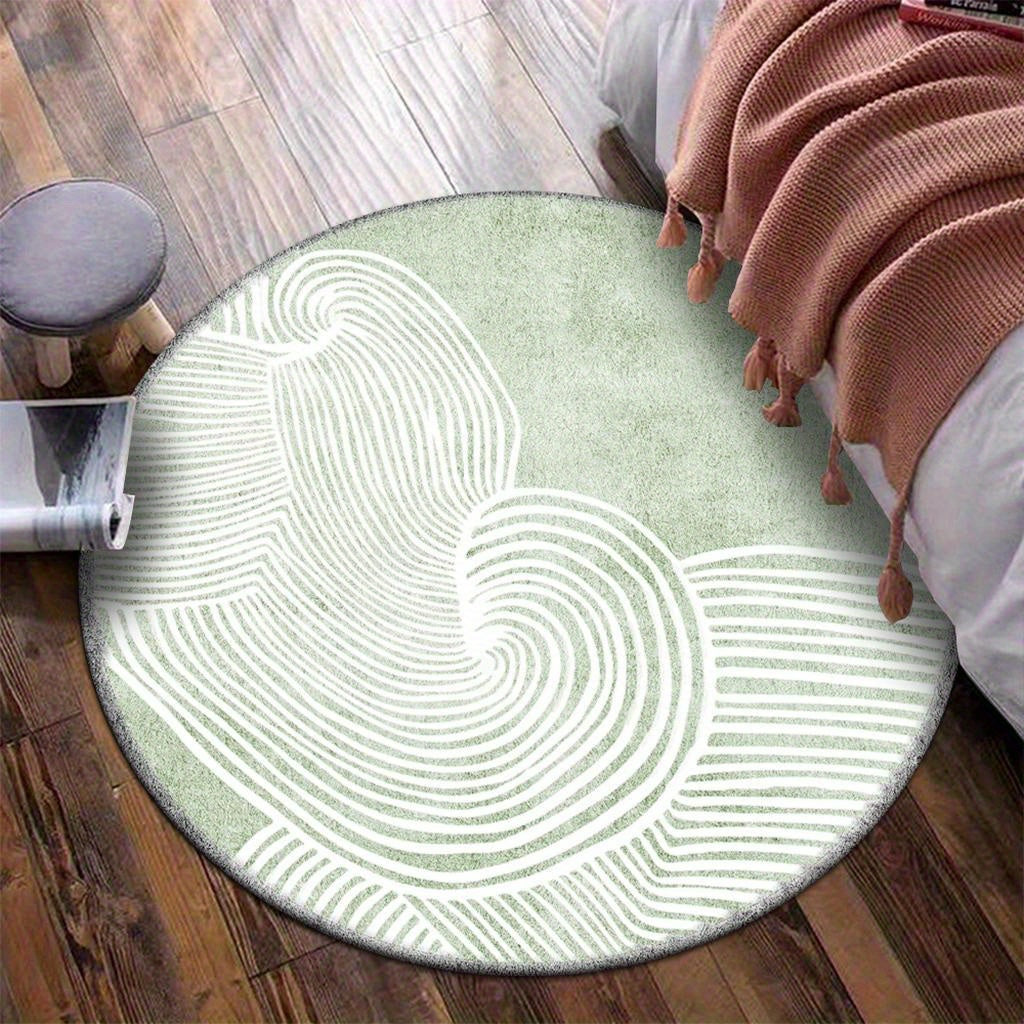 Tapis rond vert sauge à lignes courbes blanches abstraites
