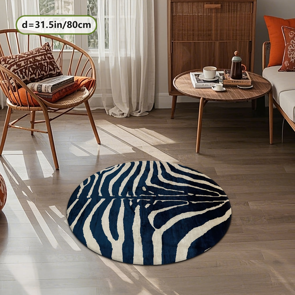 Tapis rond zébré bleu marine et crème, en velours 100 %